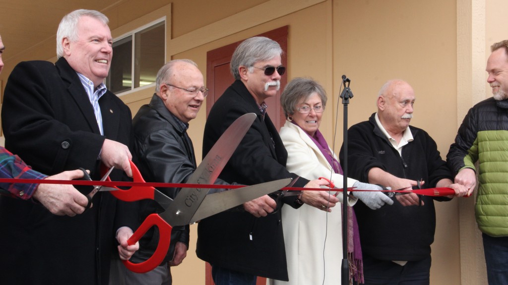 Dignitaries cut the ribbon to open the new Rotary Food Bank on. 