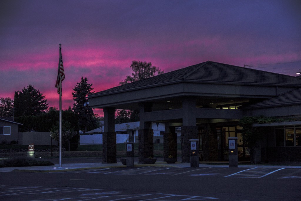 The evening sky is painted in purple and pink & blue with another signature Yakima sunset behind the Harman Senior Center
