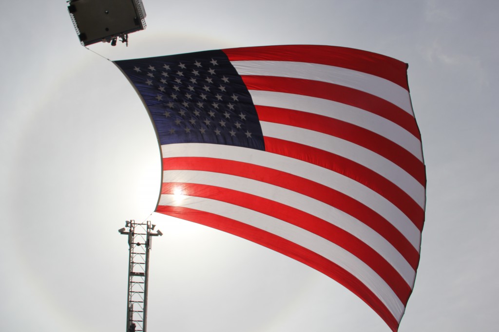 Old Glory flies high and proud at a recent fallen officer memorial in Yakima.