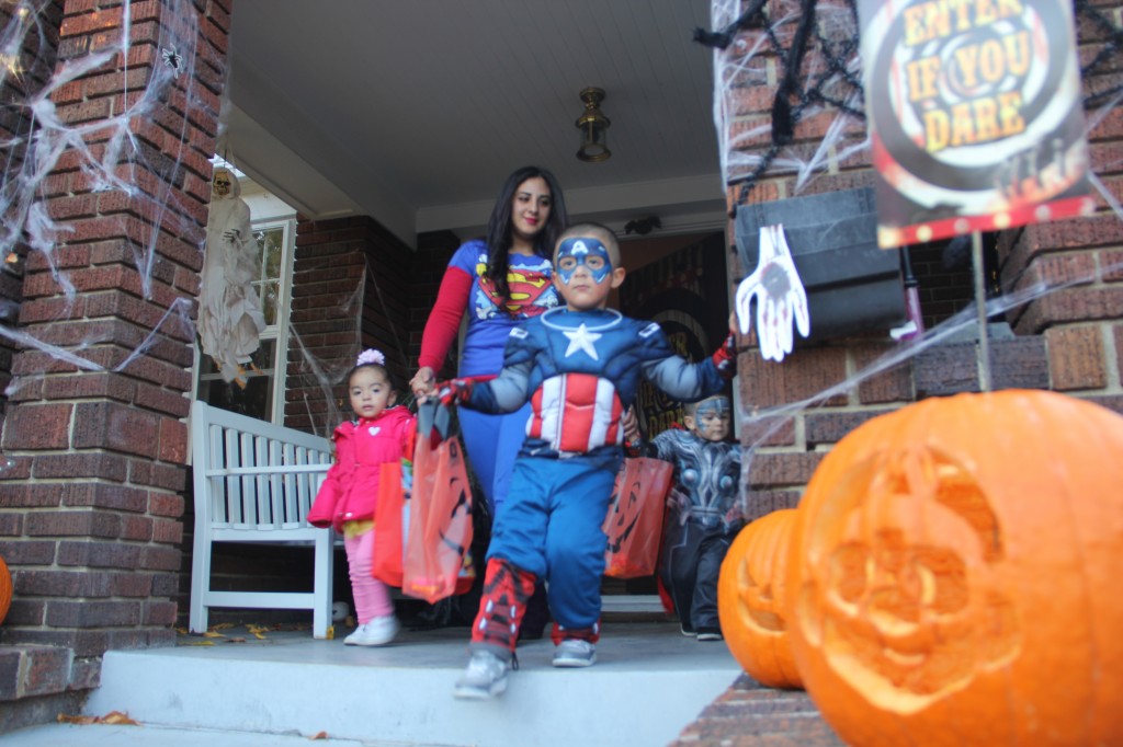 Trick or Treaters exit the porch of a “haunted” house on W. Yakima Avenue. This area is one of the City’s most popular trick or treating locations in town.