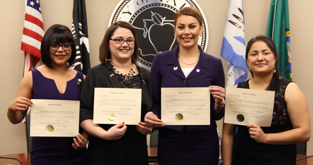 New Councilmembers (left to Right) Avina Gutiérrez, Holly Cousens, Carmen Méndez, and Dulce Gutiérrez pose for a photo with their signed Oaths of Office after being officially sworn in to serve on the Yakima City Council in 2016. 