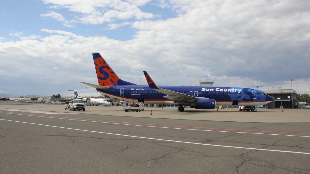 A 737 charter jet  and a Horizon Airlines commuter plane wait on the tarmac at the Yakima Air Terminal wait for passengers to load for a trip to Laughlin, Nevada and the daily scheduled flight to Seattle. Both are great options for area residents to FLY YKM to get to their destinations. 