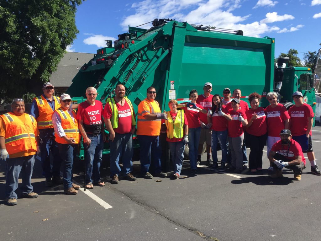 Volunteers from the Together Church of Yakima and City of Yakima employees pause for a group photo during a large community cleanup effort in the neighborhoods of Northeast Yakima. more than 100 volunteers turned out to help clean up the streets and alleys. great job and thank you all!