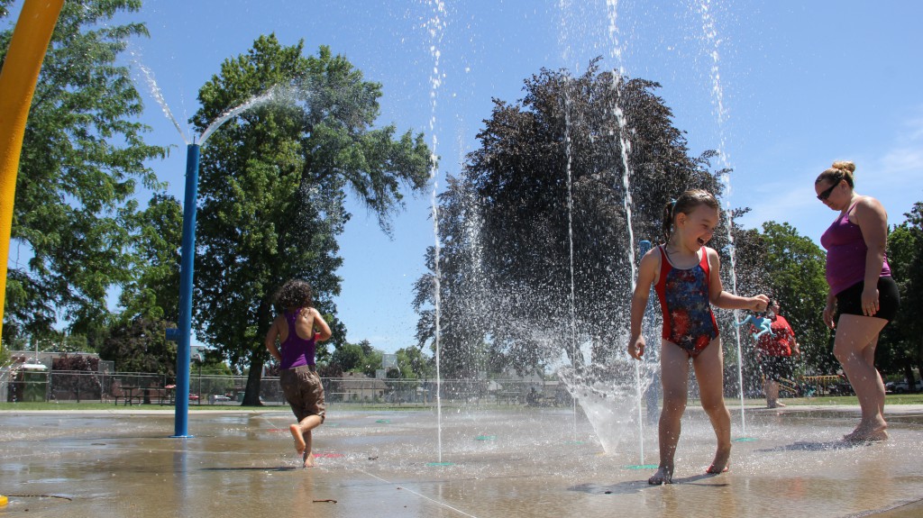 Kids and parents alike think the Miller Spray & Play Park is a pretty cool place on a rare triple digit day in June.