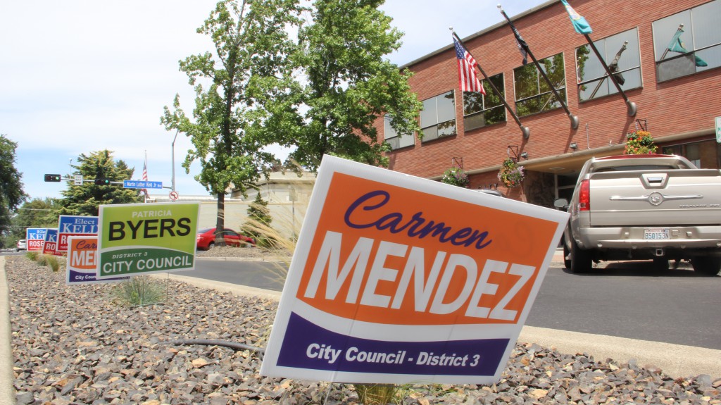 With primary election ballots set to arrive in Yakima mailboxes soon political candidate signs have recently popped up in public spaces all around town. 