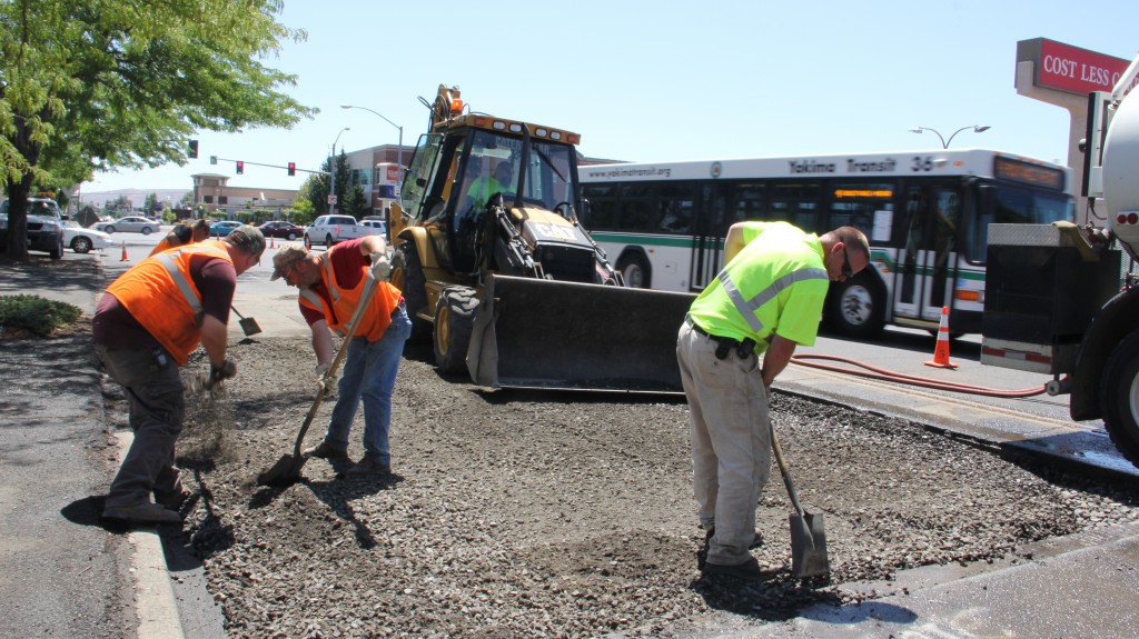 City of Yakima Street and Traffic Operations crews work to fix a segment of road that had buckled slightly over time due to a settling pipe on 5th Avenue.