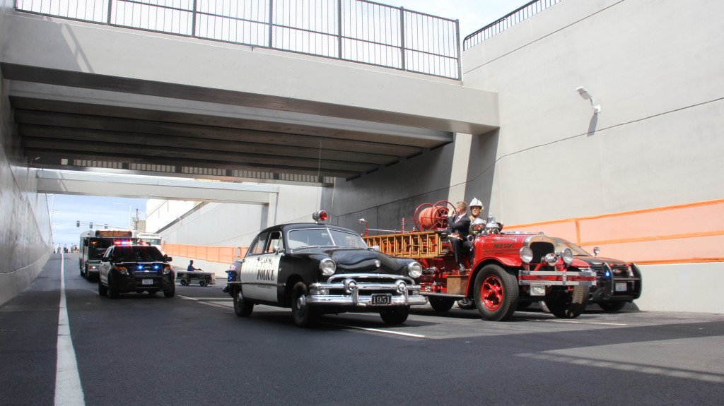 A parade of City of Yakima vehicles make the first trip through the MLK Jr. Blvd. underpass which opened ahead of schedule on July 23rd , 2014. 