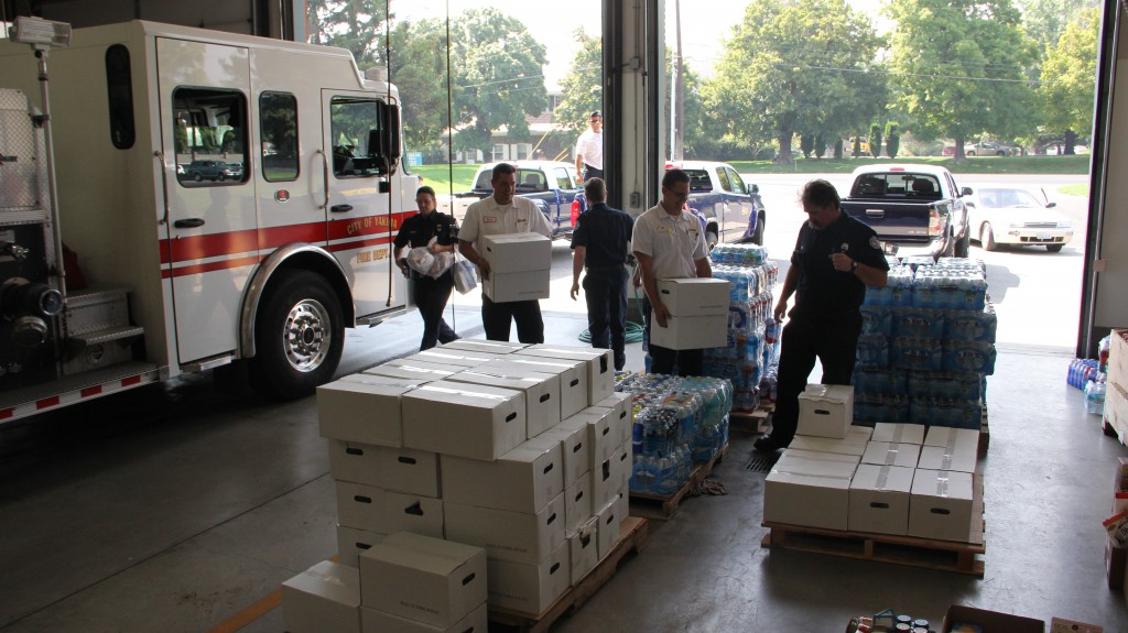 Community members and businesses stopped with donated supplies that quickly filled an engine bay at Yakima Fire Station 93. The supplies will be sent to the Okanogan Complex Fire Supply Drive.