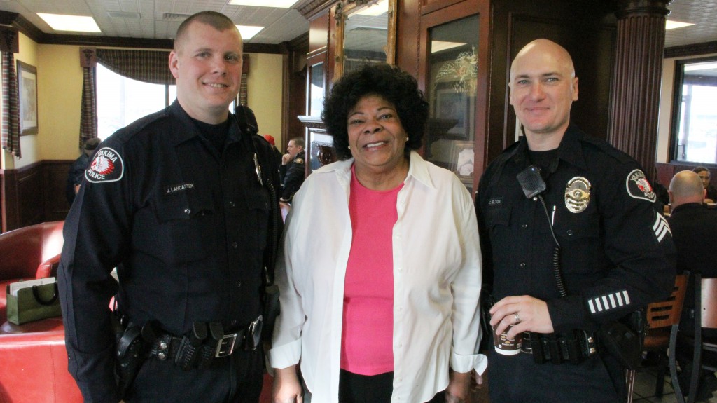 Linda Shelby poses for a photo with Yakima Police  Sgt. Chance Belton and Officer Jacob Lancaster at the first “Coffee with a Cop” gathering at the McDonald’s on South First Street. 